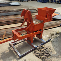 Prix bas vente Kenya rouge brique argile verrouillage brique Machines manuel verrouillage bloc pavage brique faisant la Machine moule