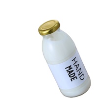 En stock, bouteilles en verre transparentes pour jus, boissons, lait, rondes, vides, de 10 oz, 12 oz, 16 oz, avec couvercle et logo personnalisé