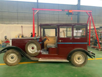Voiture électrique classique vintage à quatre portes fermées, confortable, pour le tourisme et le transport quotidien en zone résidentielle