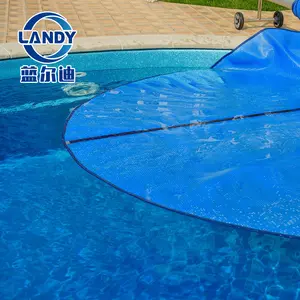 蓝色游泳池地面游泳池太阳能罩