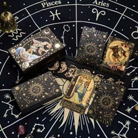 Vente en gros de cartes de tarot classiques en PVC imperméables personnalisées, modèle Soleil Univers Noir Or, emballage en boîte de couleur créative, manuel d'utilisation