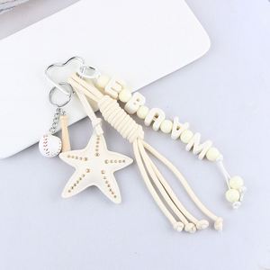 Creative DIY <b>Personalized</b> Starfish Tassel Letter Bead Leather <b>Keychain</b> Black and White Dual Color Car Bag Pendant - Product Image 6