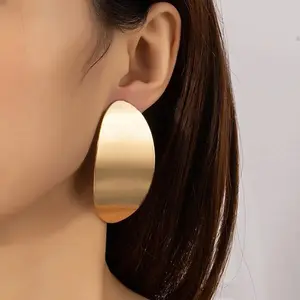 Fashion exaggerated gold plate metal retro oval brushed texture earrings jewelry for women 2023