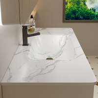Nouvel ensemble de meubles de salle de bain de luxe moderne avec vasque intégrée en dalle de roche, vasque cintrée à chaud, meuble-lavabo en bois de caoutchouc massif et miroir, caractéristiques imperméables
