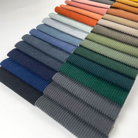 Tissu de canapé de luxe textile pour la nouvelle mode Matière première confortable en velours côtelé Tissu d'ameublement en velours côtelé uni en polyester pour canapé