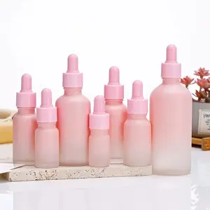 Hot Sale Phantasie rosa 10ml 20ml 30ml 50ml 100ml Serum Tropf flasche leere Glas ätherische Öl flasche mit rosa Tropfer kappe