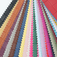 Tissu en cuir synthétique vegan en microfibre PU tissé extensible de 1 mm avec logo personnalisé en relief pour canapé, vêtements et décoration intérieure