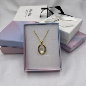 NFC Integrated Necklace with Mini <b>Tag</b> 14K Gold Finish RFID Technology Moonstone/Clear Quartz Material - Product Image 1