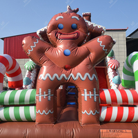 Combo gonflable de Noël avec marionnette et canne à sucre - Château gonflable festif avec toboggan pour location de fête de fin d'année