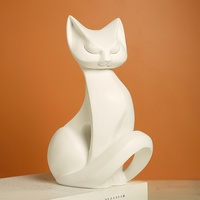 Minimalistische Weiße Abstrakte Sitzende Katzen-Figur aus Harz im Nordischen Stil Tier-Statue für Heim-Tischdekoration