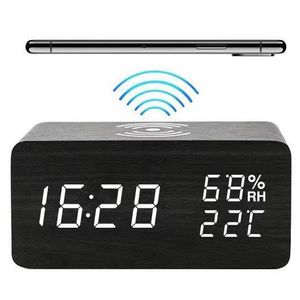 <span class=keywords><strong>Horloge</strong></span> à LED de style moderne avec chargement sans fil Design artistique à la mode pour un usage domestique Affichages d'aiguilles <span class=keywords><strong>en</strong></span> plastique à <span class=keywords><strong>mouvement</strong></span> de quartz - Product Image 1