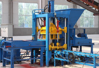 Machine de fabrication de briques creuses en béton entièrement automatique de haute précision Qt3-15 avec moteur et PLC 220V/380V/440V, durée de vie de 10 ans, livrée sur camion.
