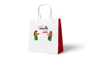 Bolsa de papel blanco reutilizable y reciclable impresa personalizada con diseño de mango moderno para Embalaje limpio y necesidades de compras - Product Image 3