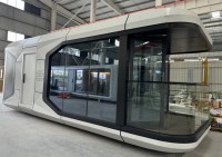 Maison capsule spatiale préfabriquée à bas prix Petite maison avec système intelligent pour hôtel Mooncabin et location de
