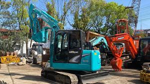 Mini-excavatrice Kobelco SK60 avec godet de terrassement d'une capacité de 0,12 m³, poids opérationnel de 6 tonnes, moteur Kawasaki, modèle Geospec - Product Image 5