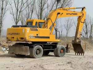 Vente Urgente : Excavatrice sur pneus HYUNDAI 210W, état quasi neuf (90%) |   Pompe hydraulique Hyundai |   Inspection OEM du moteur d'origine - Product Image 3