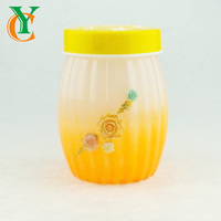 Pot en verre de 1350ml avec design de peinture de fleur sculptée et couvercle à vis pour le stockage des aliments Capacité de 45oz pour bonbons Biscuit miel