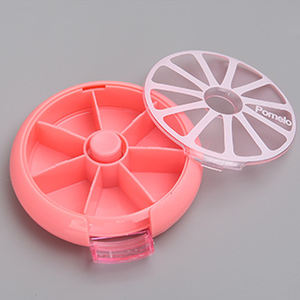Petite boîte à pilules <span class=keywords><strong>hebdomadaire</strong></span> rotative en plastique personnalisée en gros pour le stockage de médicaments - Product Image 1