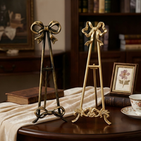Nouveau support de présentation en métal avec nœud papillon, style nordique moderne, pour décoration de table, mini chevalet, cadre en fer robuste pour la décoration intérieure