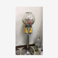 Distributeur automatique de boules rebondissantes de bonbons à pièces de nouvelle conception avec support