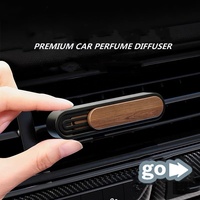 Diffuseurs de parfum de luxe personnalisables pour voiture, en cuir, métal, avec plaque coulissante en bois et motif floral en alliage, pour l'intérieur de la voiture, vente en gros