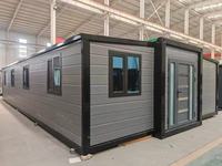 Maison préfabriquée modulaire mobile à double aile extensible, personnalisable en usine, de 2 à 6 chambres, pour bureau, design moderne
