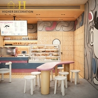 Conception de comptoir de bar bleu et rose sur mesure pour café de luxe avec vitrine en verre pour équipement de café moderne
