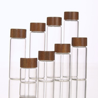 Flacon en verre cylindrique transparent en borosilicate de 24 mm 30 mm avec bouchon à vis en bois pour l'emballage alimentaire et le stockage de tri des grains de café