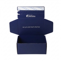Boîte d'expédition personnalisée de luxe bleue avec fermeture éclair, bande déchirable et impression de logo pour solutions d'expédition e-commerce haut de gamme