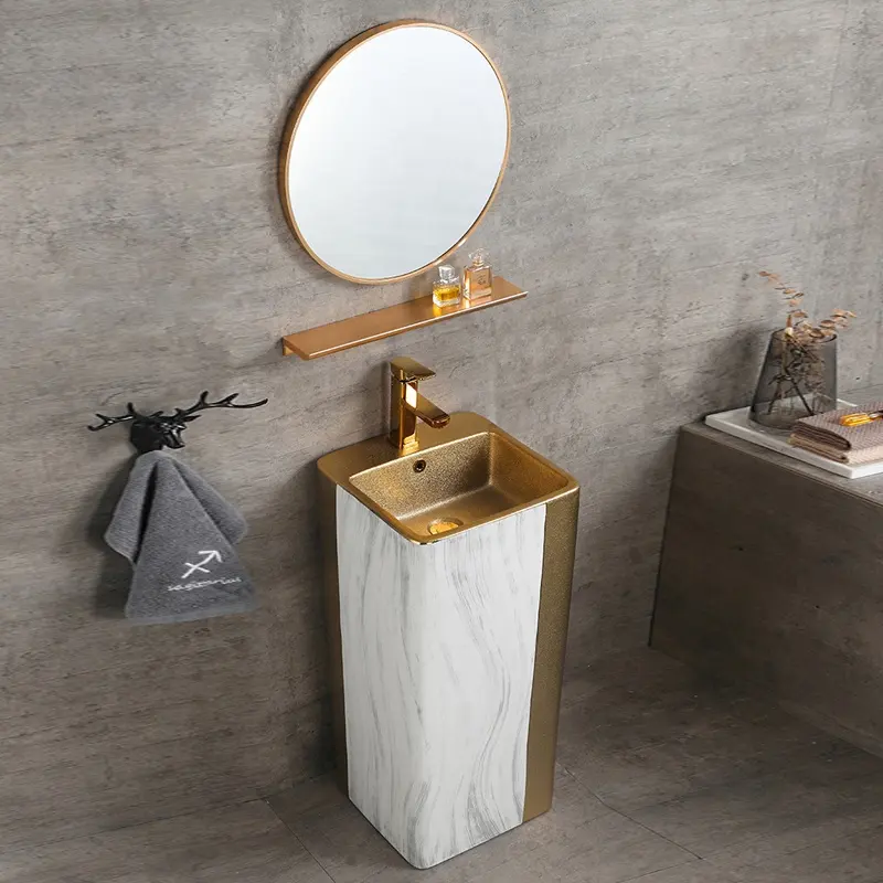 Lavabo de salle de bains moderne autoportant en acier inoxydable doré avec cadre en marbre noir naturel