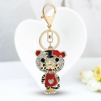Porte-clés 3D en métal motif petit tigre brillant avec diamants, accessoire de mode pour sacs et voitures, cadeau pour femmes