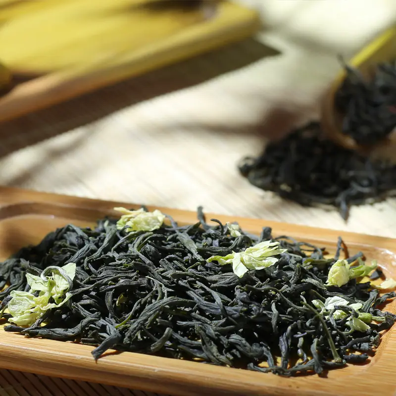 Chine Chunmee Feuilles de thé vert au jasmin Boule de thé de fleurs séchées Sachets de thé vert au jasmin en fleurs