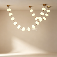 Luminaire suspendu linéaire en forme de boule d'albâtre naturel de luxe, cadre en laiton, pour salle à manger, villa, comptoir de bar, décoration