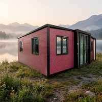 Maison de plage modulaire portable extensible de 20 pieds avec structure en acier et entrée en verre pour station balnéaire et hôtel côtiers
