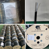 Kabel serat optik GJXH, dalam ruangan luar ruangan G657A2 1fo 2 core 4 benang FTTH kabel jatuh datar 2.0 5.2mm gulungan 1km 2km