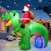 Père Noël gonflable lumineux sur un Tyrannosaurus Rex vert avec boîte cadeau pour la décoration de jardin, boutique, festival, exposition