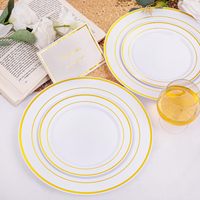 Vente en gros d'assiettes en plastique écologiques et durables à rebord or/argent Vaisselle jetable de luxe pour mariages