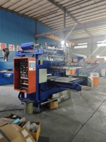 Machine de découpe de précision hydraulique automatique double face haute performance à bras mécanique pour tôles industrielles et caoutchouc