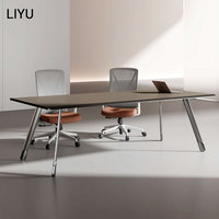 Table de conférence moderne Liyu avec base architecturale LED intégrée, chaises en cuir, mobilier de bureau pour salle de réunion