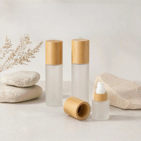 Flacon de lotion en verre givré écologique de luxe avec bouchon pompe en bambou, flacon de lotion cosmétique vide 30ml 50ml 100ml pour les soins de la peau