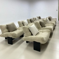 Fauteuil d'appoint minimaliste en bouclette avec ottoman - Fauteuil lounge de luxe style crème avec base sculpturale pour salon moderne