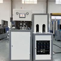 Proveedor de ahorro de energía Agua mineral superior Máquina de fabricación de latas de bebidas de moldeo de botellas manual de dos cavidades