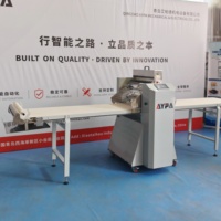 Machine à pâte feuilletée automatique pour la laminage continu de la pâte et le saupoudrage de farine
