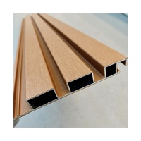 Vente en gros Panneau mural cannelé en plastique et aluminium composite Wpc Revêtement mural Protection UV extérieure