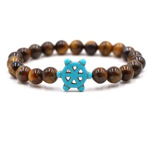 Bracelet à breloques en pierres naturelles œil de tigre, <span class=keywords><strong>pierre</strong></span> <span class=keywords><strong>volcanique</strong></span>, <span class=keywords><strong>pierre</strong></span> paon, amazonite, forme cercle et gouvernail de bateau - Meilleure vente pour le commerce international - Product Image 1
