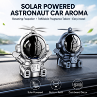 Mini diffuseur de parfum solaire en plastique pour voiture, en forme d'astronaute, avec hélice rotative et parfum longue durée