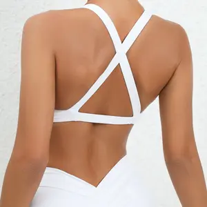 Soutien-gorge de sport sexy de haute qualité pour femmes avec logo personnalisé Naked Feel Front Twist Back Cross Fitness