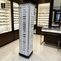 Promotion : Présentoir à lunettes sur pied blanc 192 places avec roulettes pivotantes pour exposition de montures