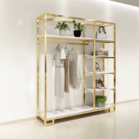 Nouveau Système d'Affichage Mural Doré pour Vêtements T-Shirts et Boutiques – Présentoir de Magasin