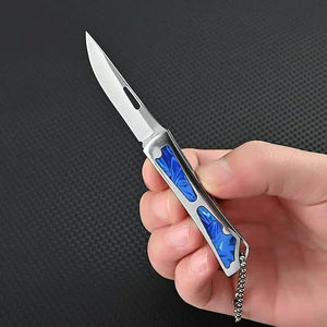 Mini cuchillo plegable multifuncional de alta dureza para exteriores, para frutas, defensa personal, portátil, con llavero. - Product Image 2